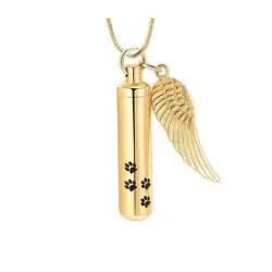 Gold pendant necklace featuring a cylindrical charm adorned with black paw prints and a gold angel wing—an elegant memorial keepsake, ideal for pet cremation in Harris County, TX.