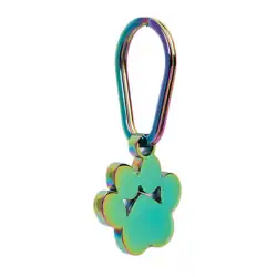 A metal keychain with a paw-shaped charm and an iridescent, rainbow-colored finish—a thoughtful keepsake for pet cremation in Harris County, TX.