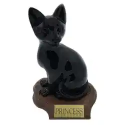 A black cat figurine sits on a brown base with a gold nameplate that reads "PRINCESS," making a touching tribute for pet cremation Harris County, TX.