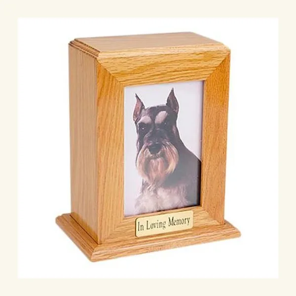 Vertical oak photo urn with a framed photograph of a pet