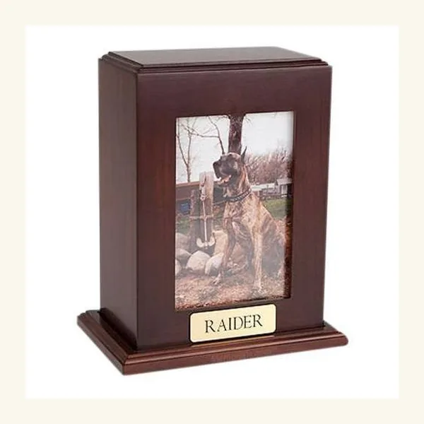 Vertical walnut photo urn with a framed photograph of a pet